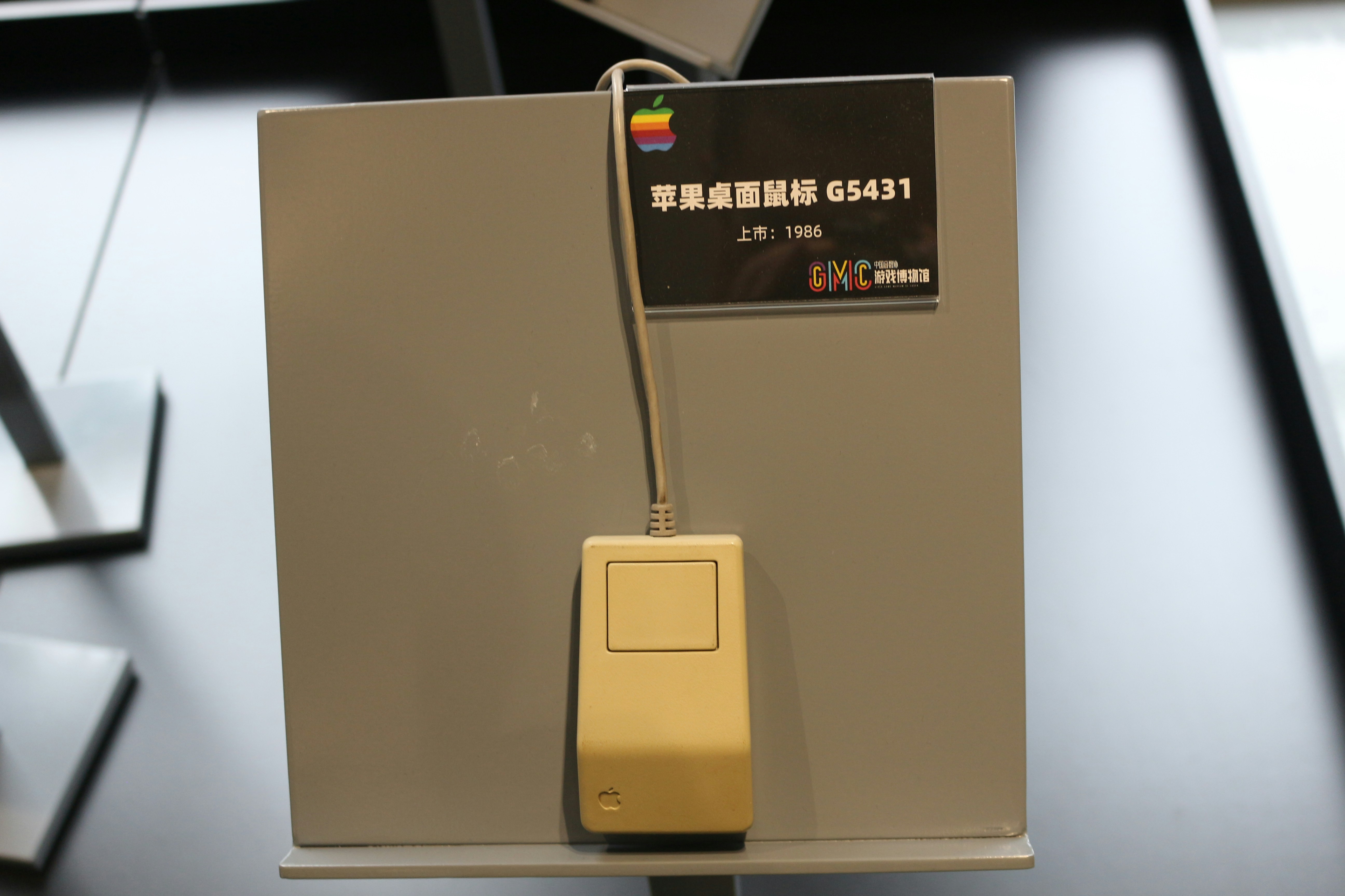 A computer desk with a keyboard and mouse
