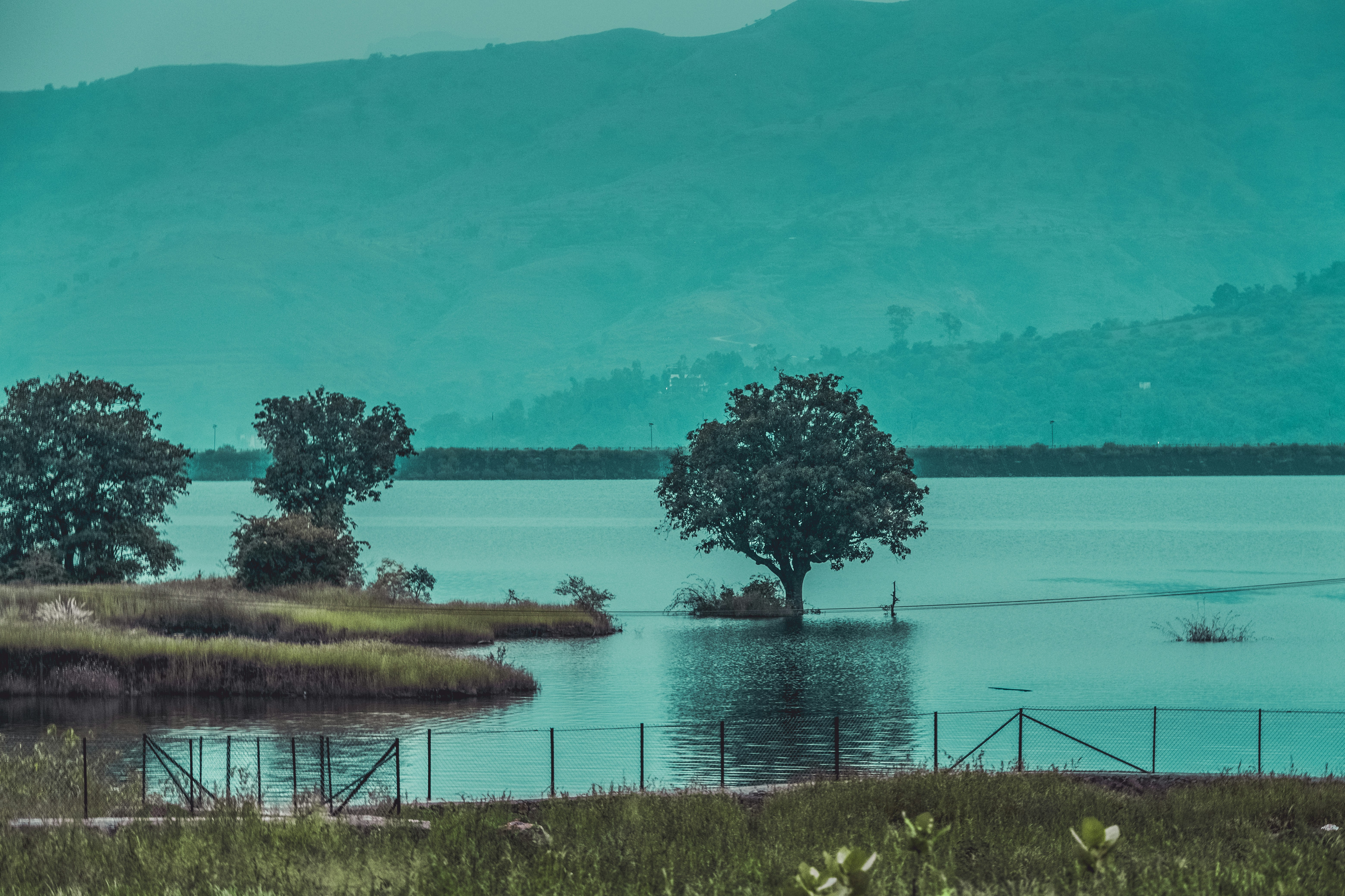 A large body of water surrounded by mountains