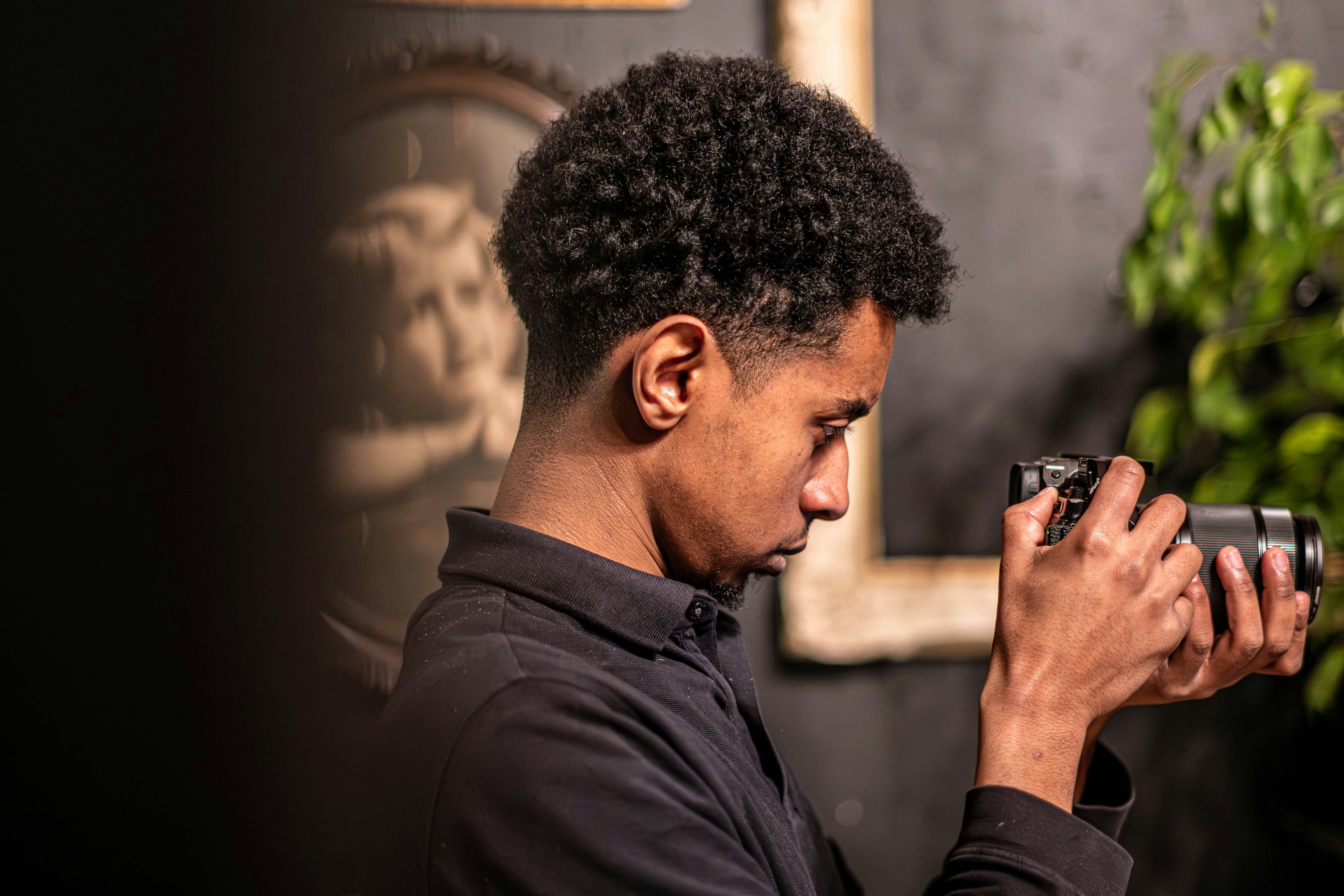 A man taking a picture with a camera