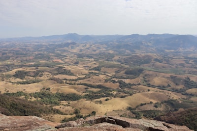 A view of a valley from the top of a mountain