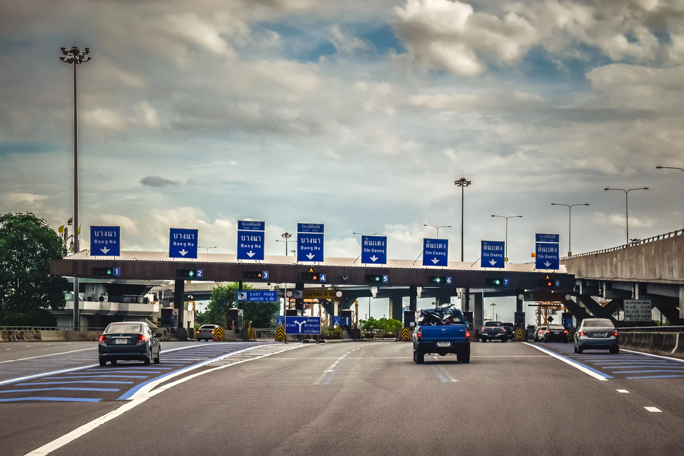 Traffic approaching a motorway toll plaza