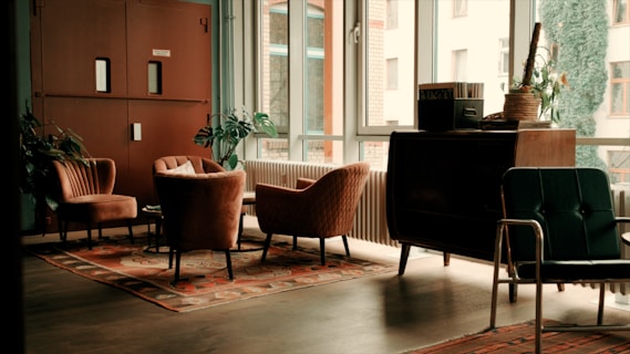A living room filled with furniture and lots of windows