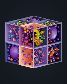 A cube with a bunch of balls inside of it