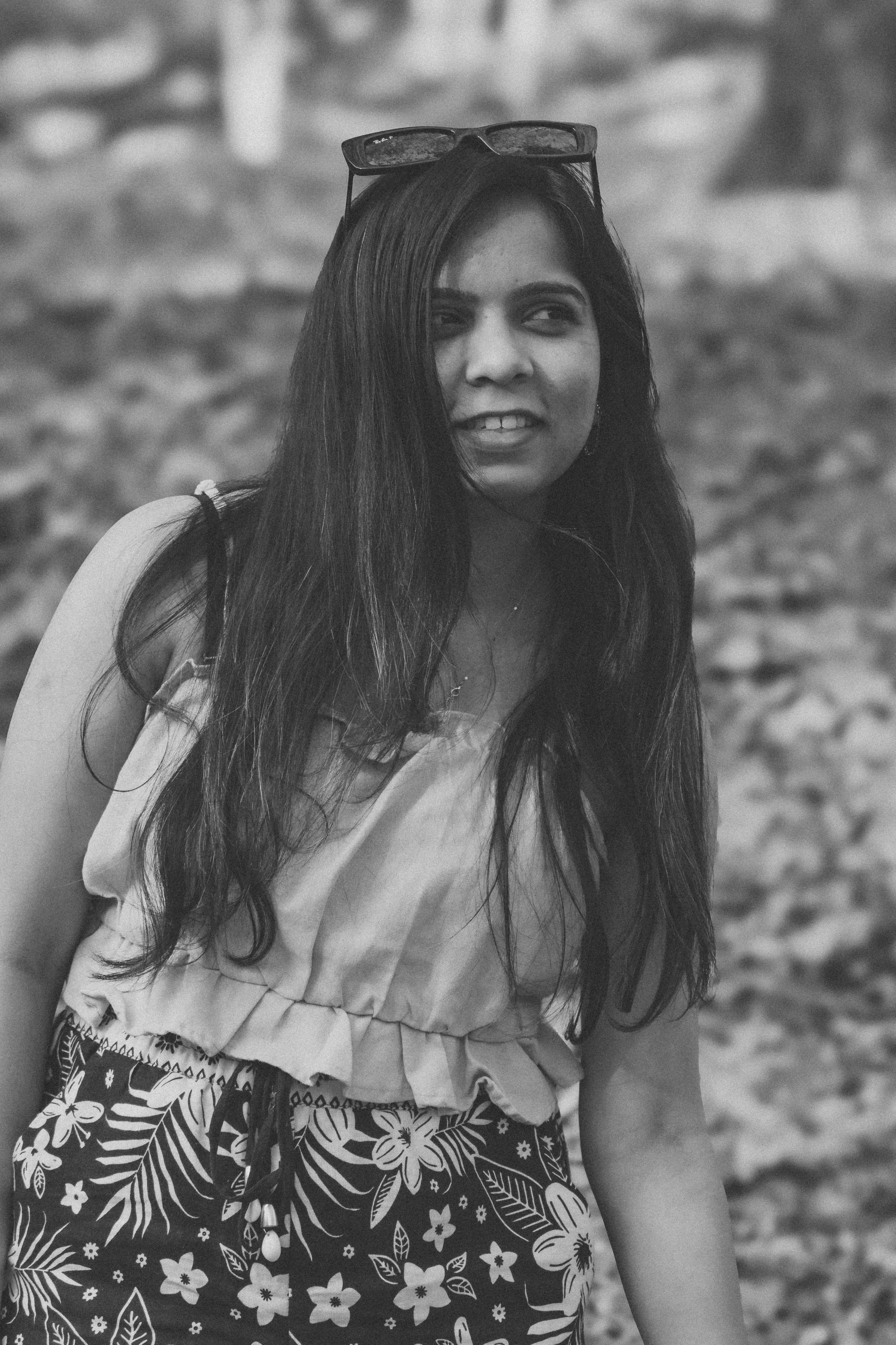 A black and white photo of a woman with long hair
