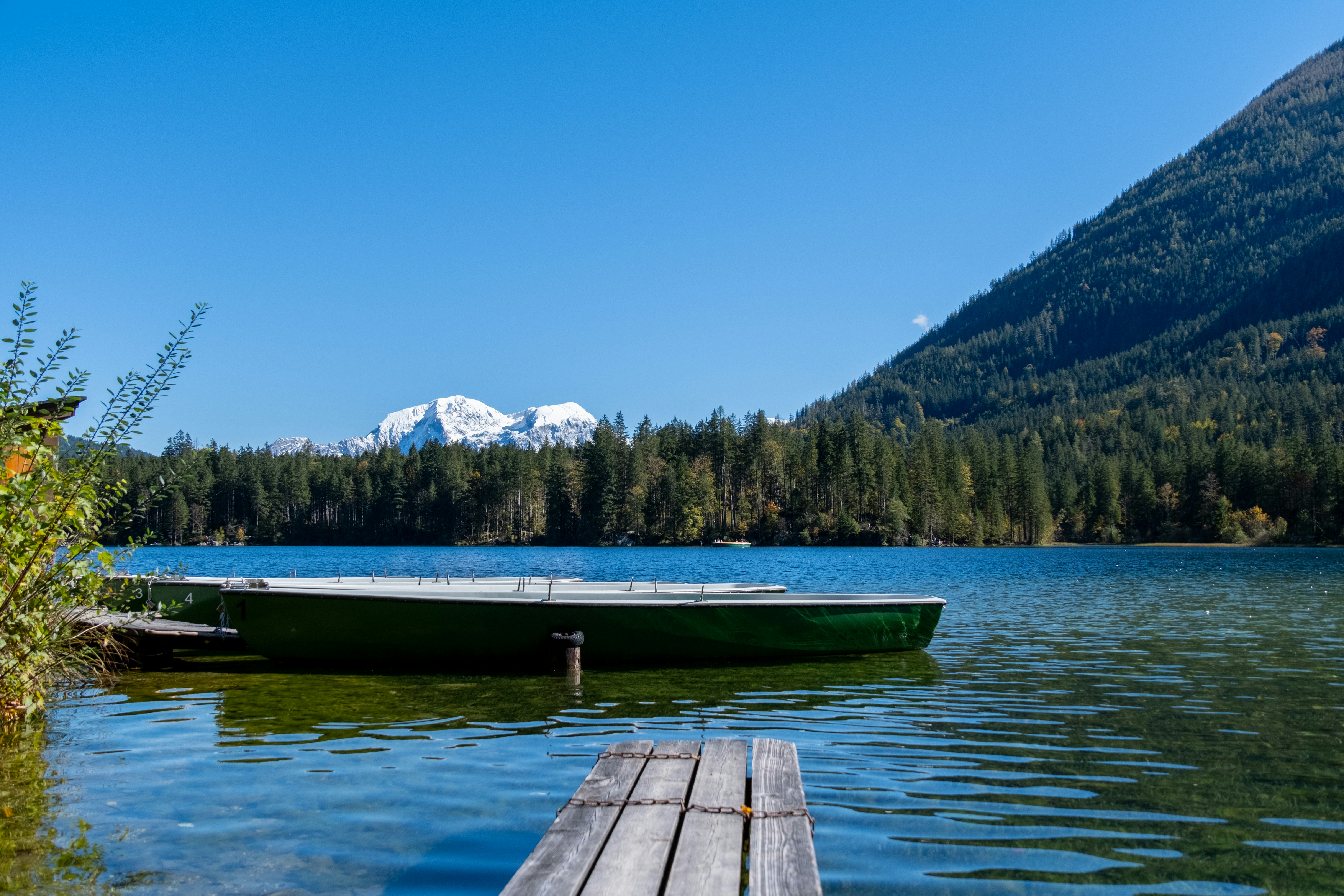 A wooden dock sitting next to a body of water