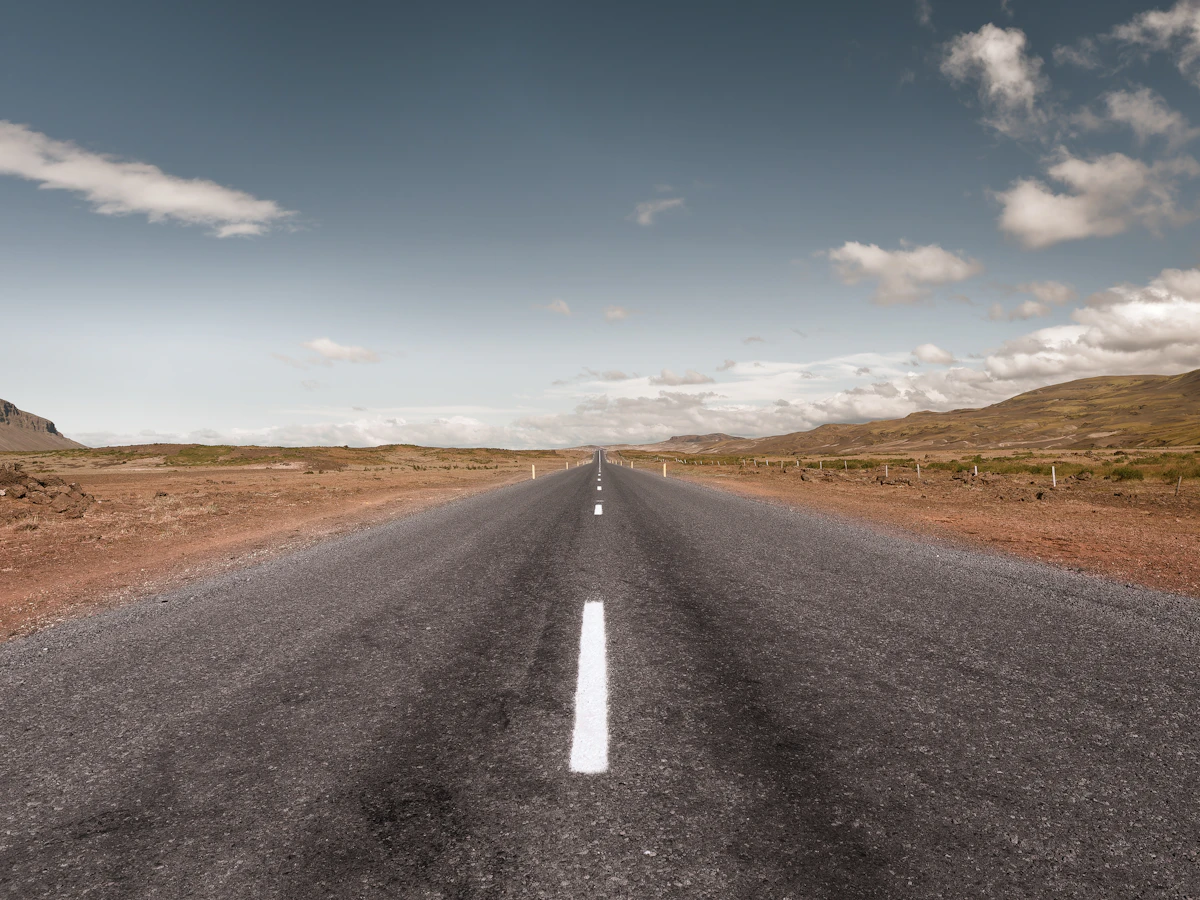 An open road stretching into the distance, representing the timeline of memories reviewed in Lifespan Integration