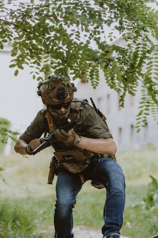 A man with a gun in his hand