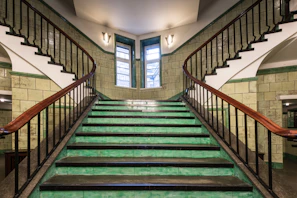 A set of stairs leading up to a window
