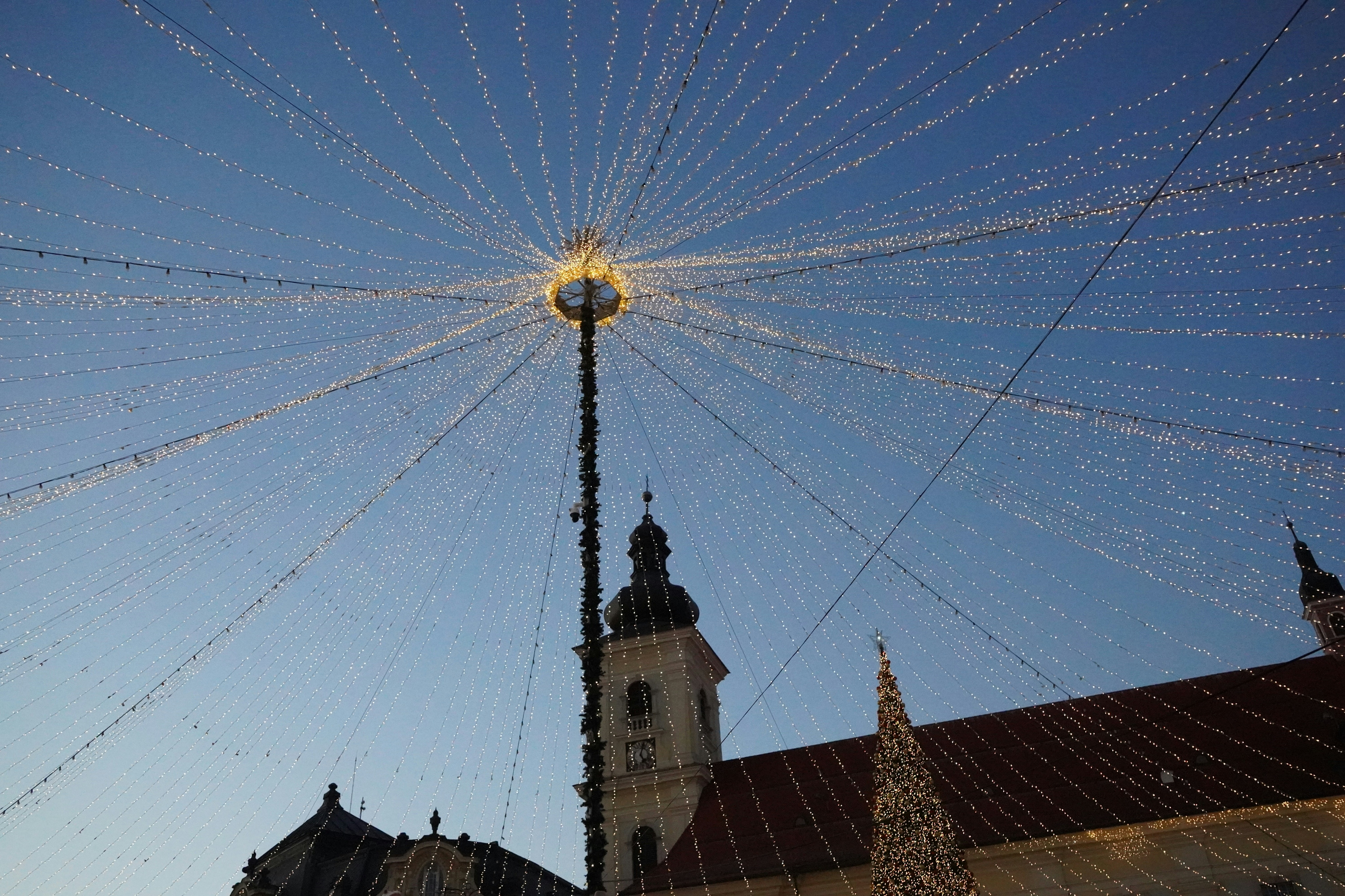 A very tall building with a clock on it's side