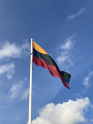 A flag is flying high in the sky