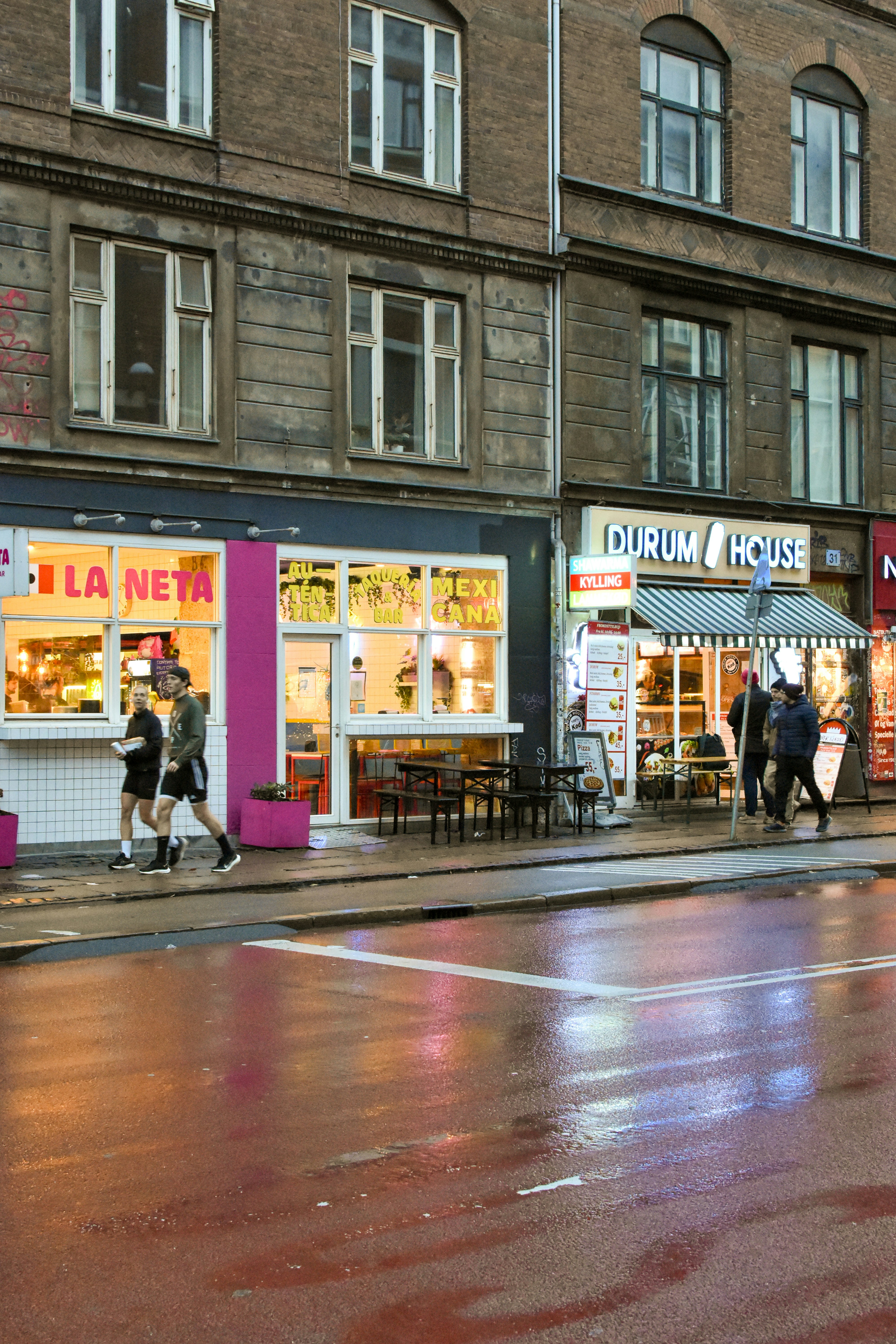 A vibrant street view near 405 Howard Street showcasing cafes and shops