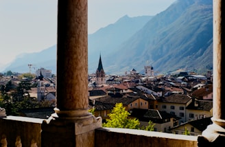 A view of a city with mountains in the background