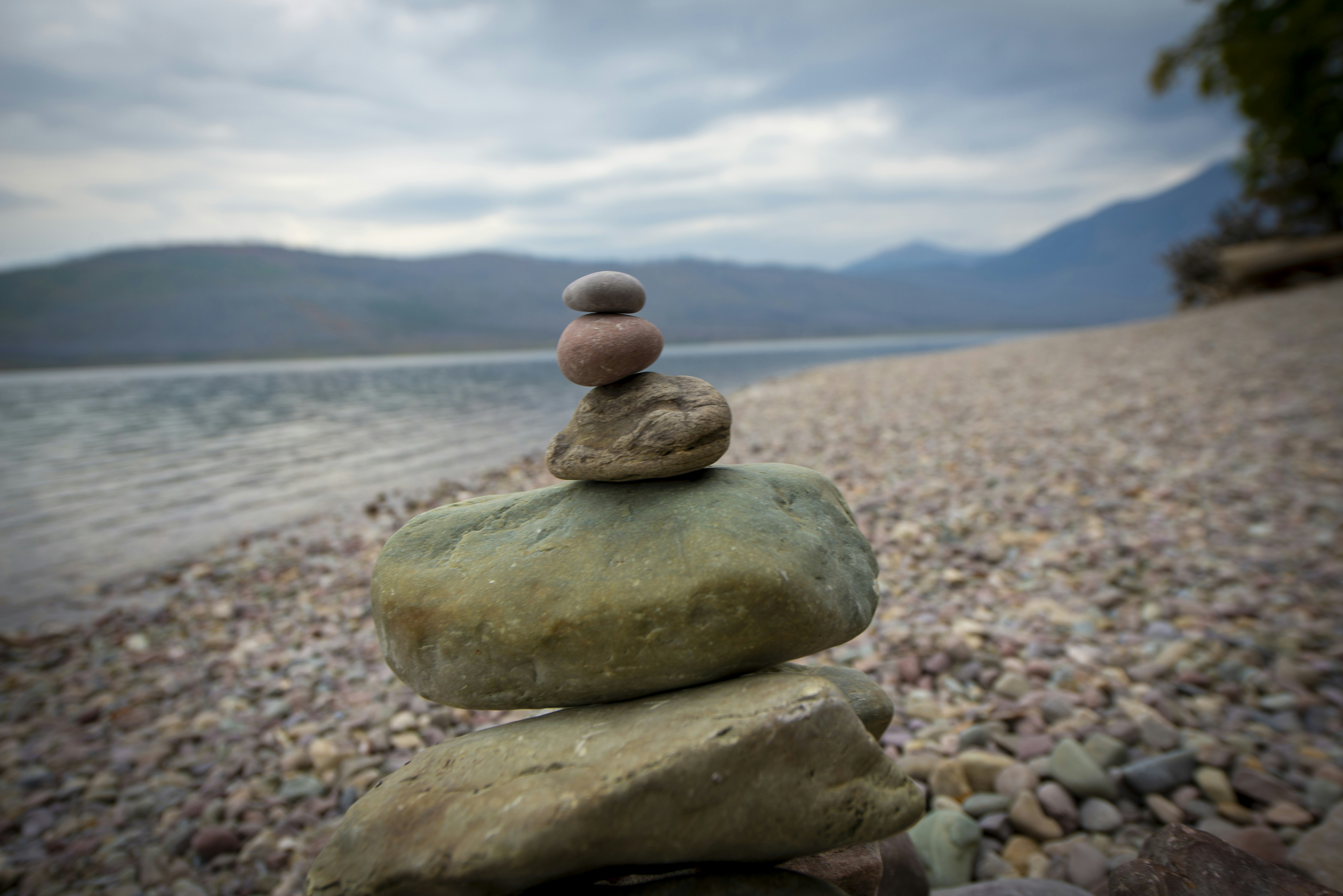 A stack of rocks sitting on top of a beach