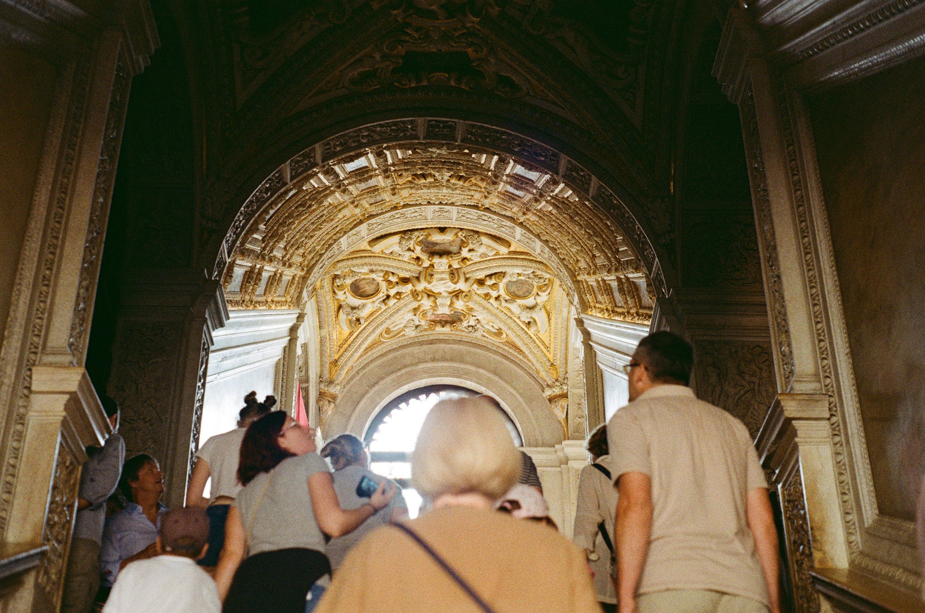 A group of people walking up a flight of stairs photo – Free Stairs ...