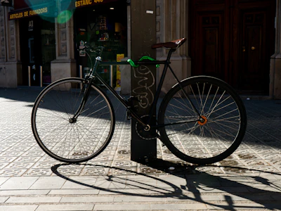 A bicycle parked on the side of a street