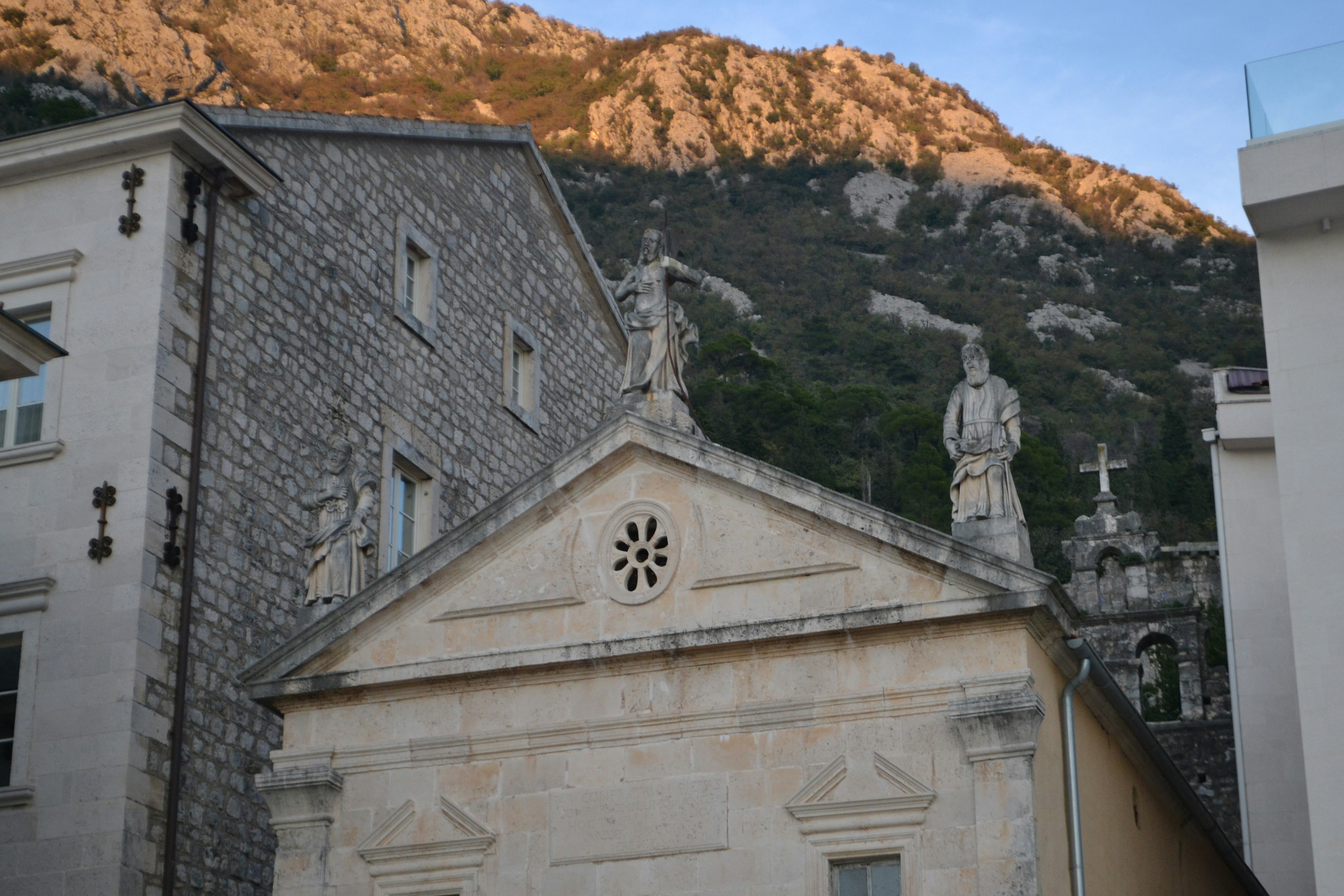 A church with a mountain in the background