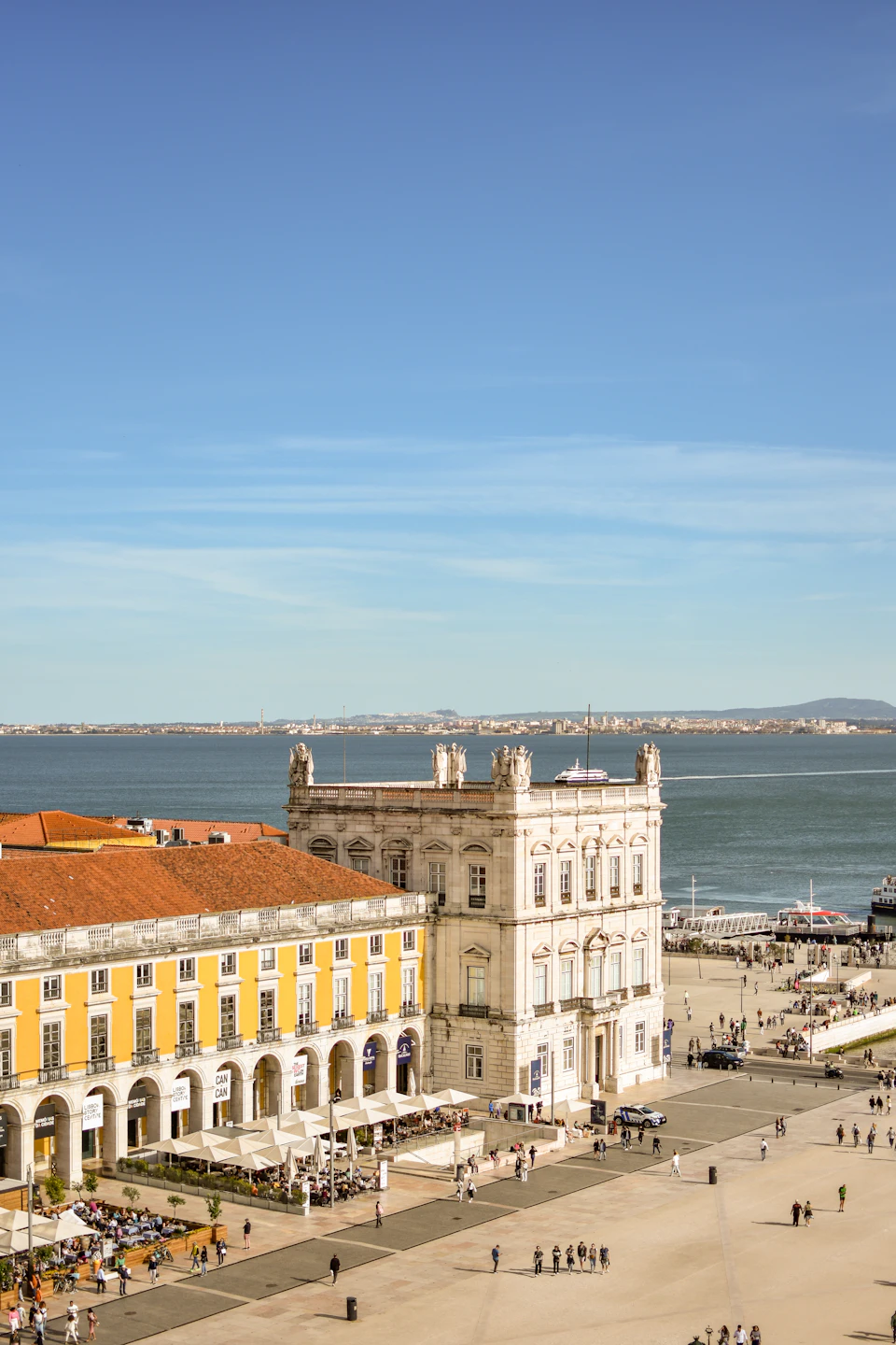 Lisbon's riverfront squares open up under the clear, lengthening light of spring