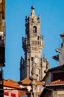 A tall clock tower towering over a city
