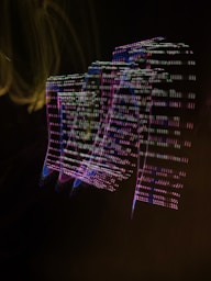 A blurry image of a building in the dark