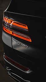 A close up of the tail lights of a car