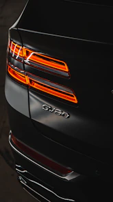 A close up of the tail lights of a car