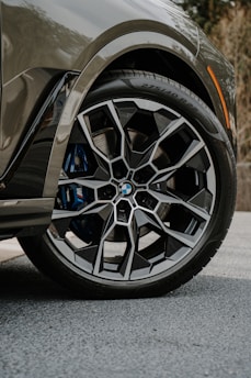 A close up of a car tire on a street