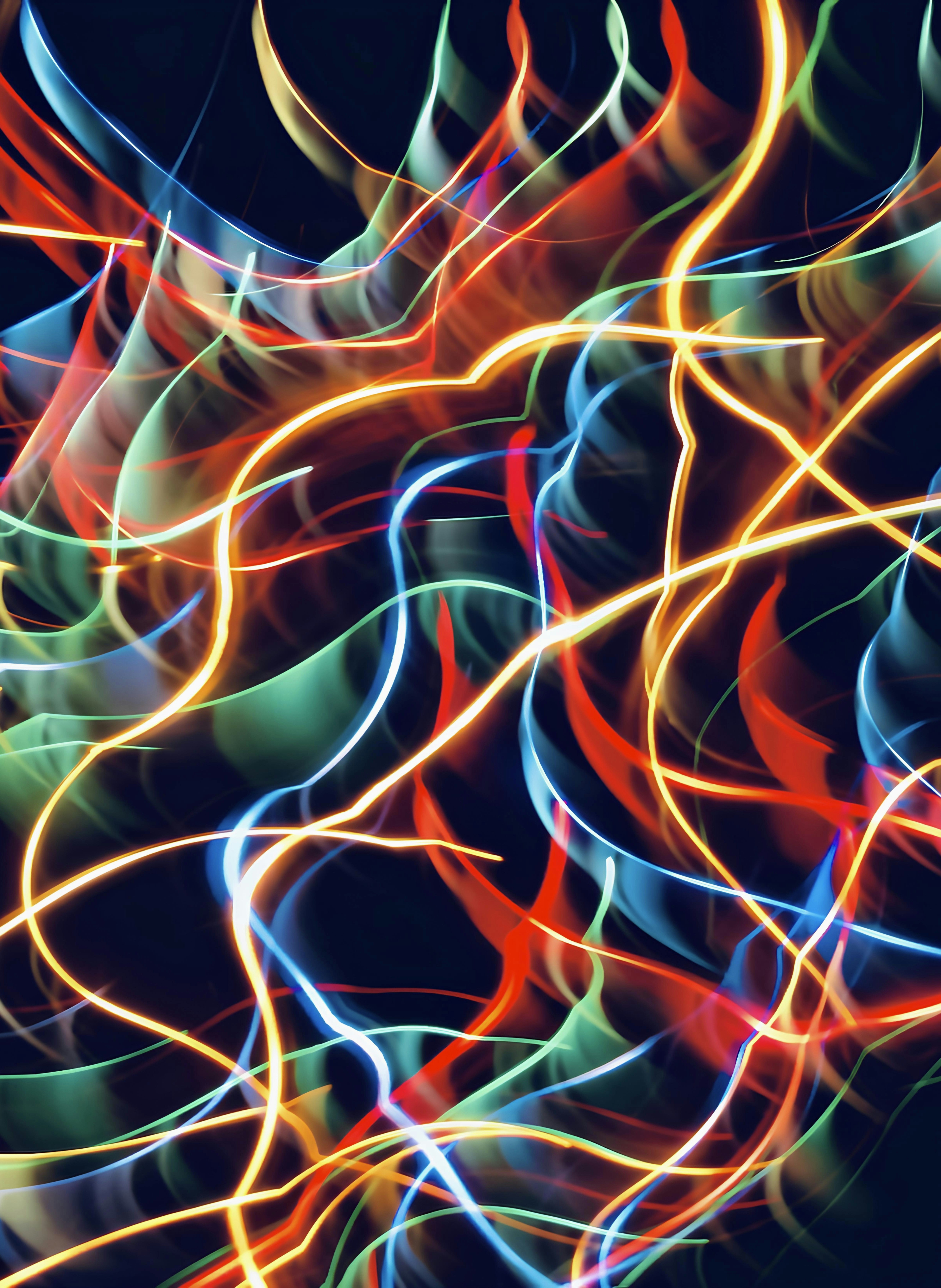 Abstract light patterns wallpaper, ilustrasi artikel Illuminate Your Event: Transform Your Venue with Strategic Lighting 1