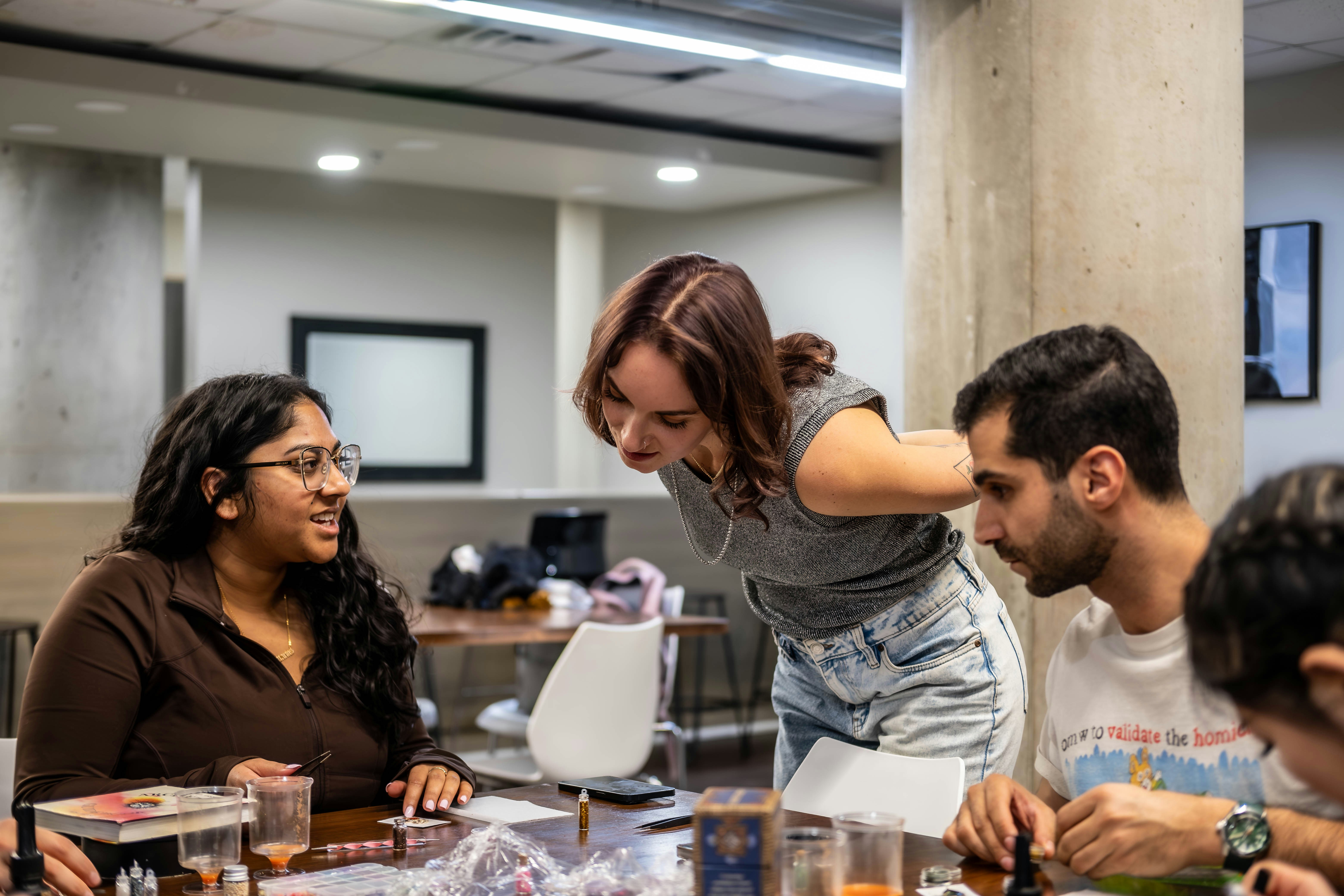 A group of people sitting around a table