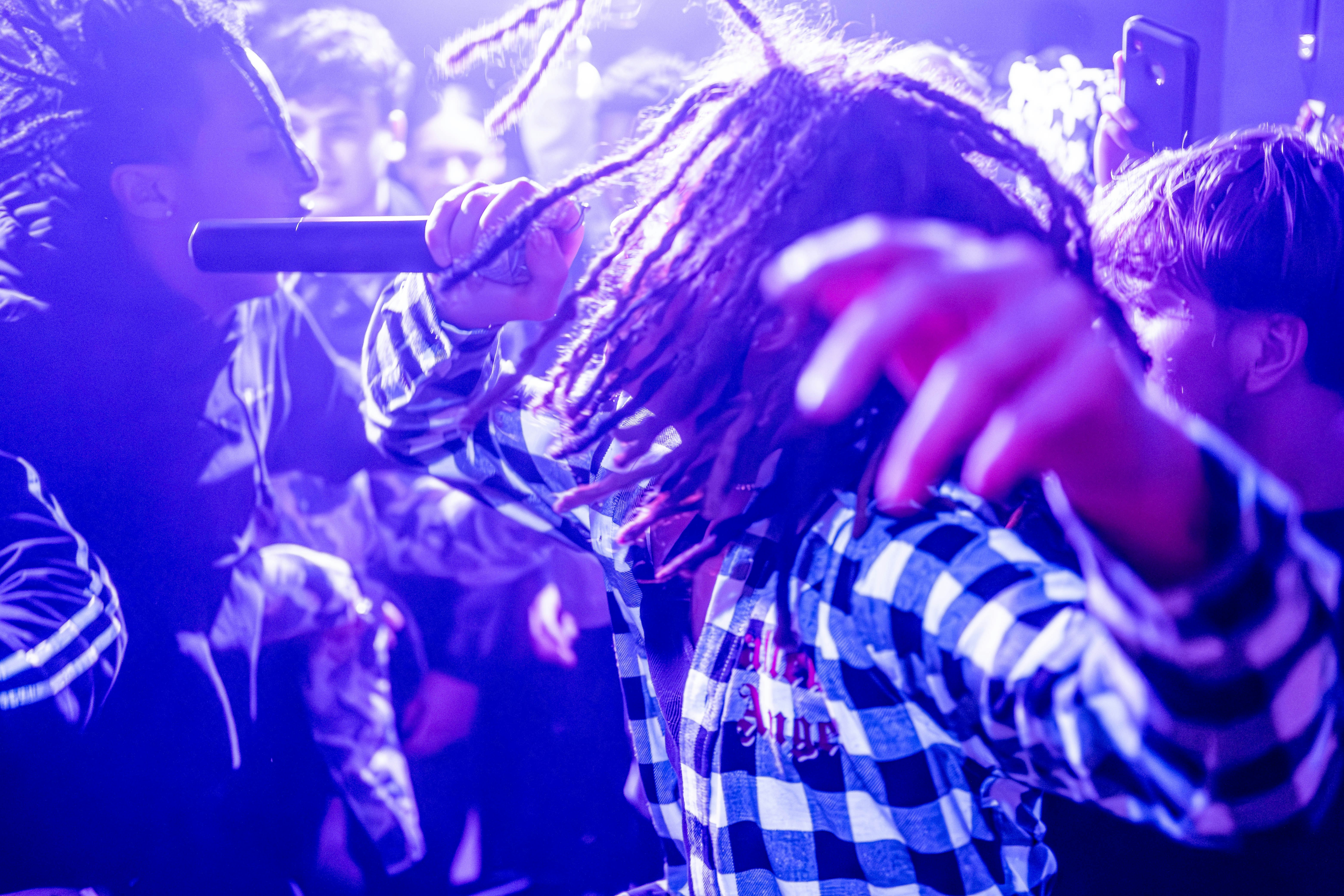 A group of people standing next to each other on a stage