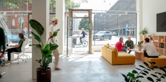 A group of people sitting around a living room