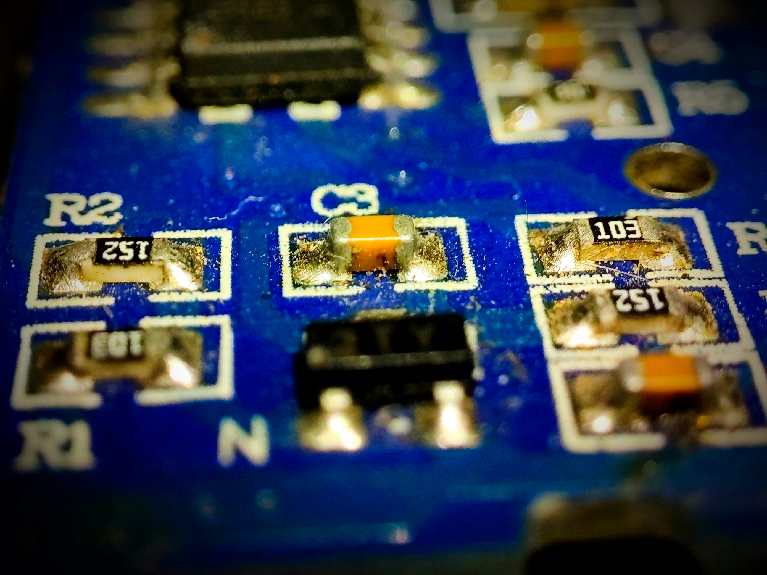 Close-up of soldered electronic components on circuit board
