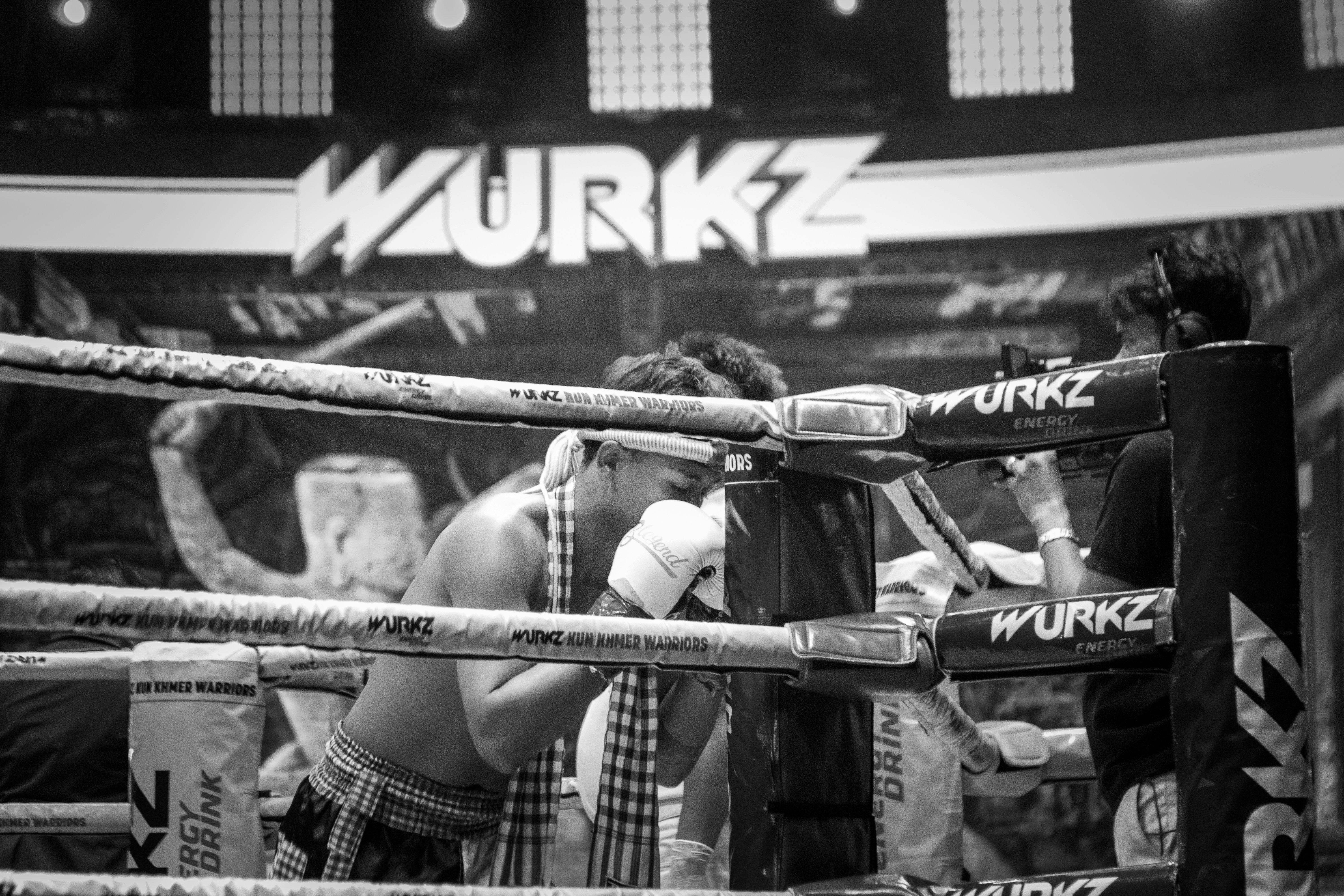 A black and white photo of a boxing ring