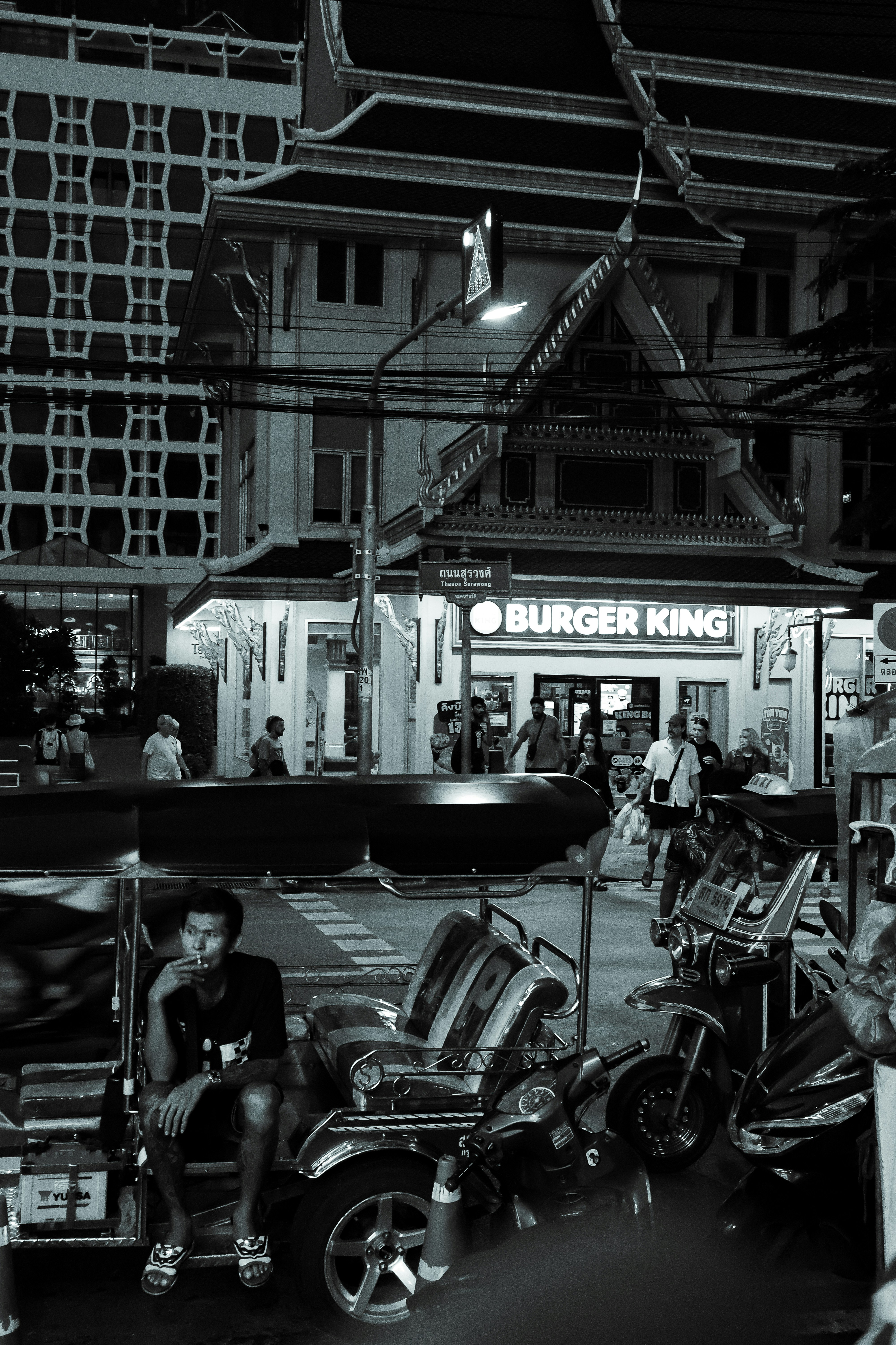A group of motorcycles parked next to each other