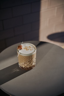 A cup of coffee sitting on top of a table