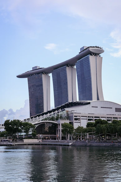 A large body of water next to a tall building