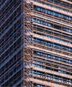 A very tall building with lots of scaffolding on it