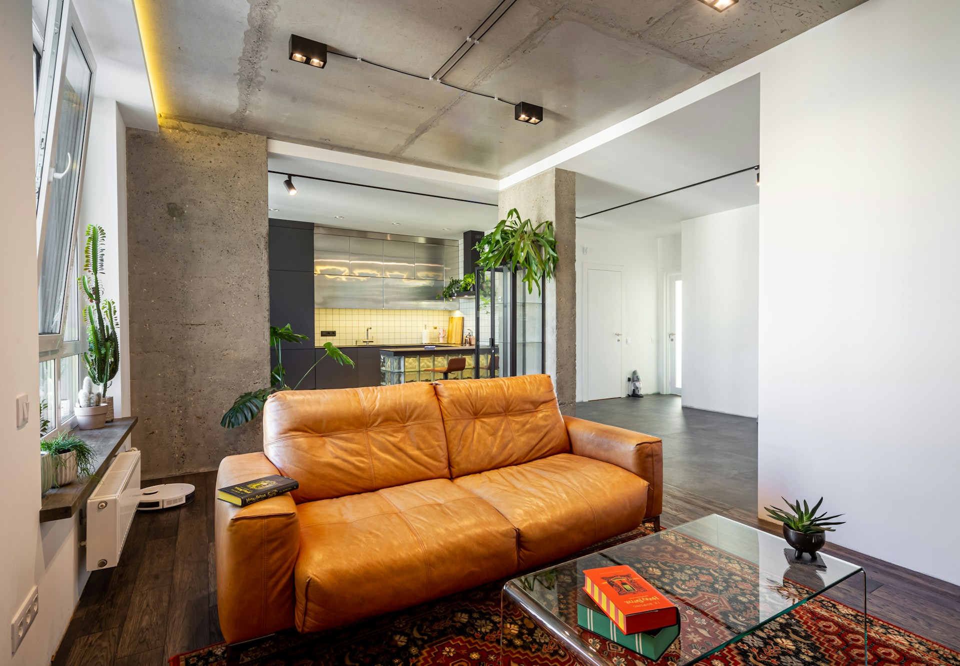 A living room with a couch and a coffee table