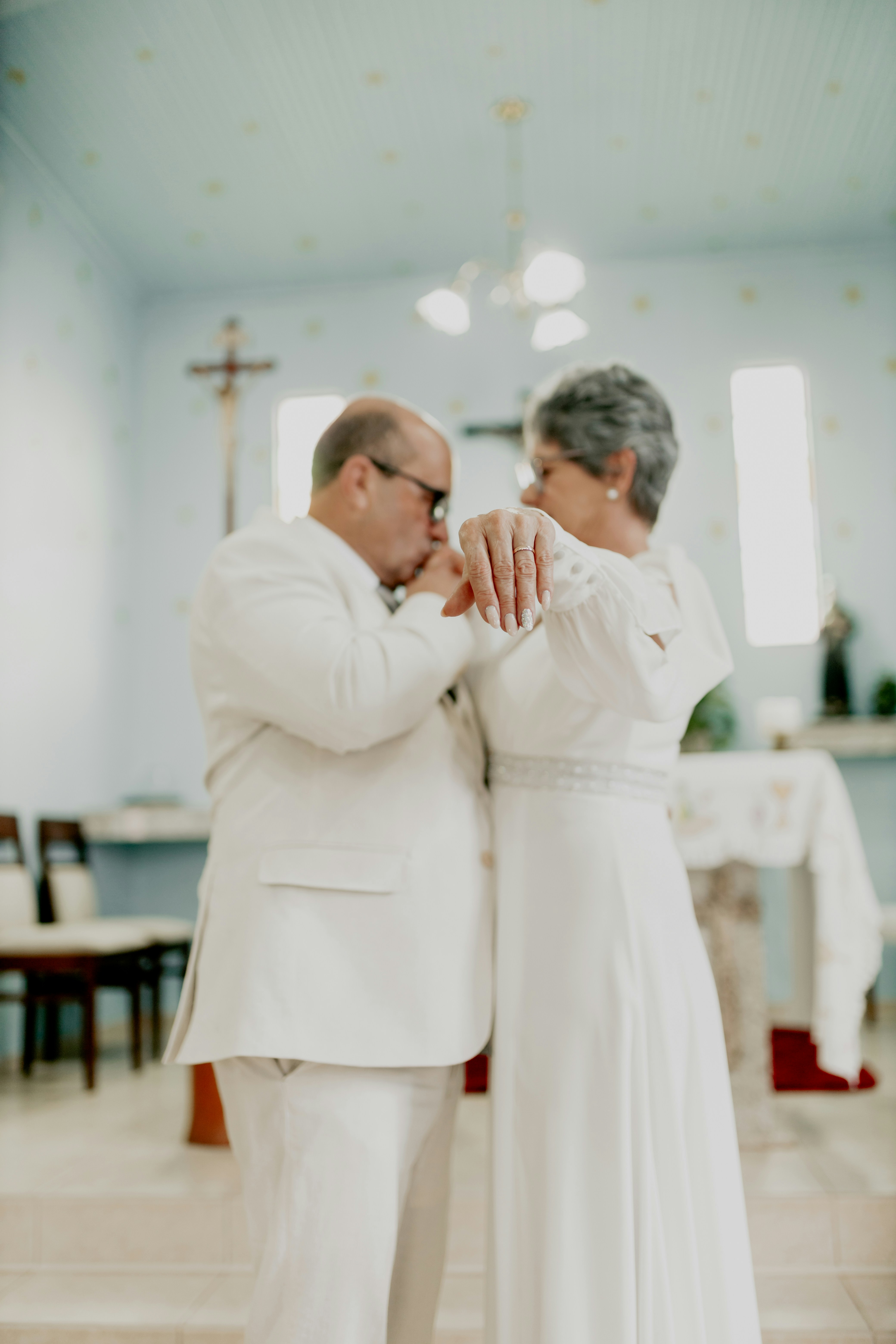A couple of people that are standing in a room