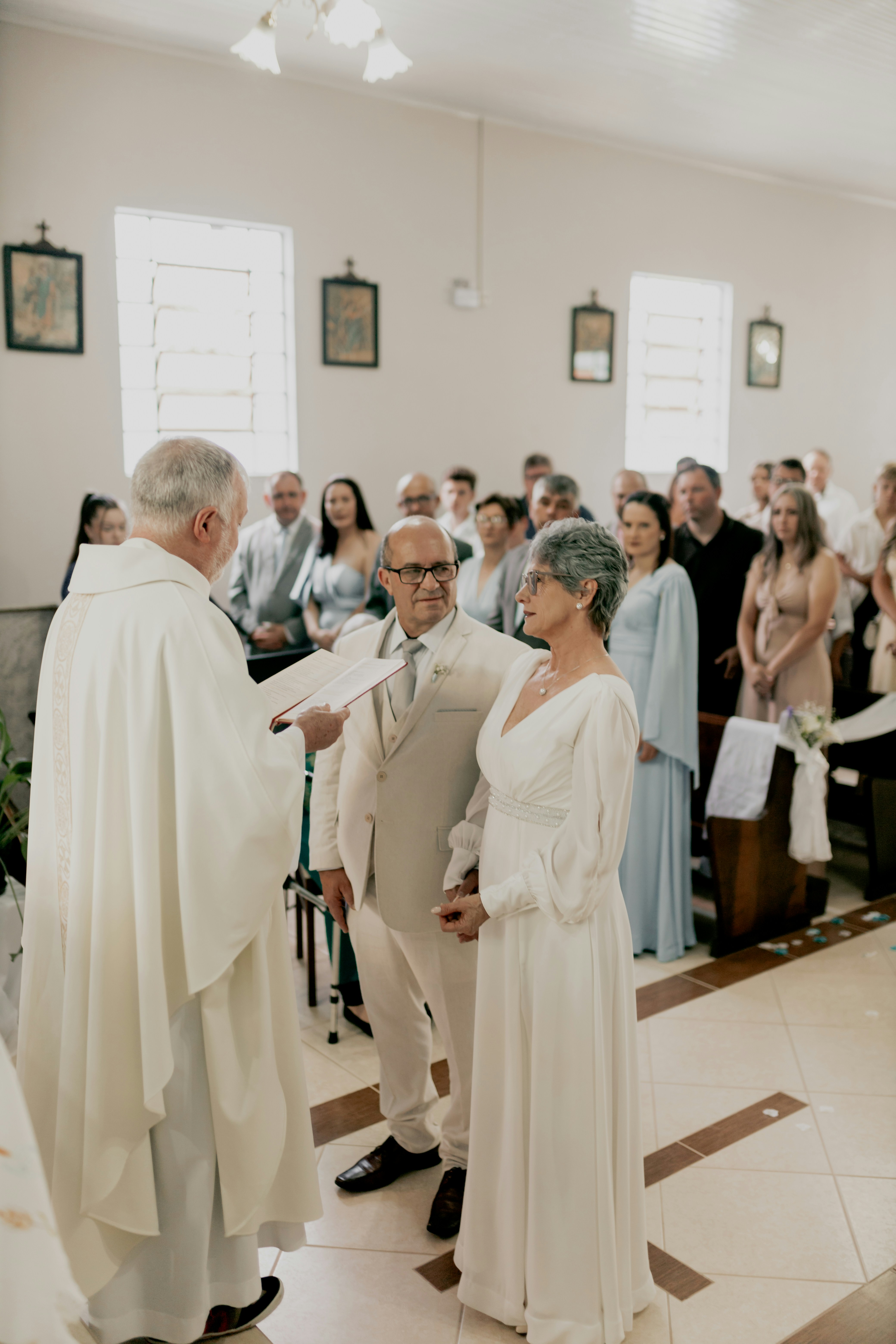 A group of people standing around a church