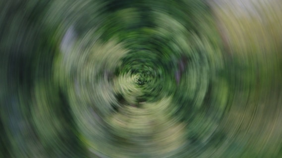 A blurry photo of a green circular object