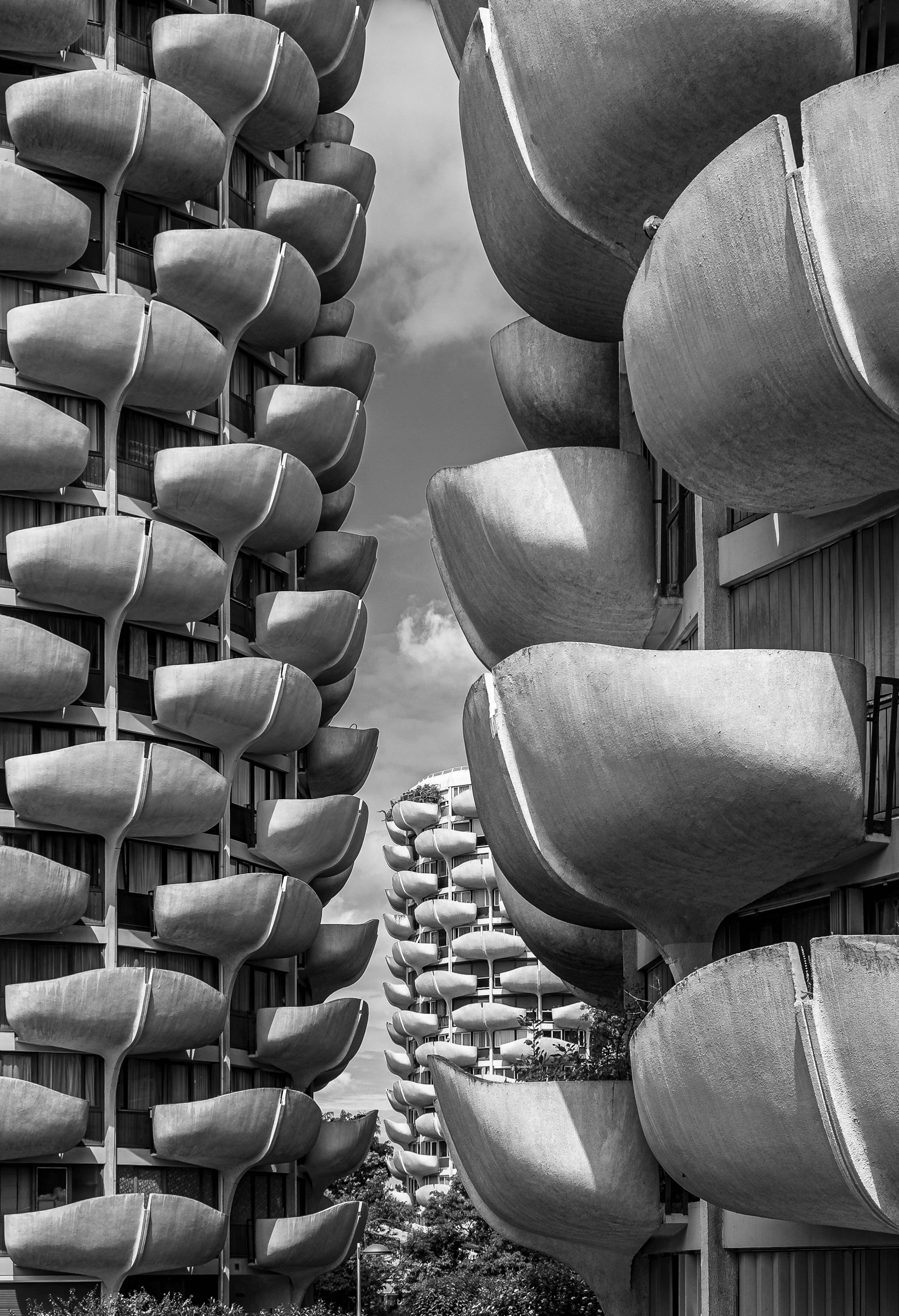 A black and white photo of a tall building
