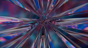 An abstract image of a starburst in blue and pink