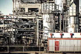 A large factory with lots of pipes and pipes