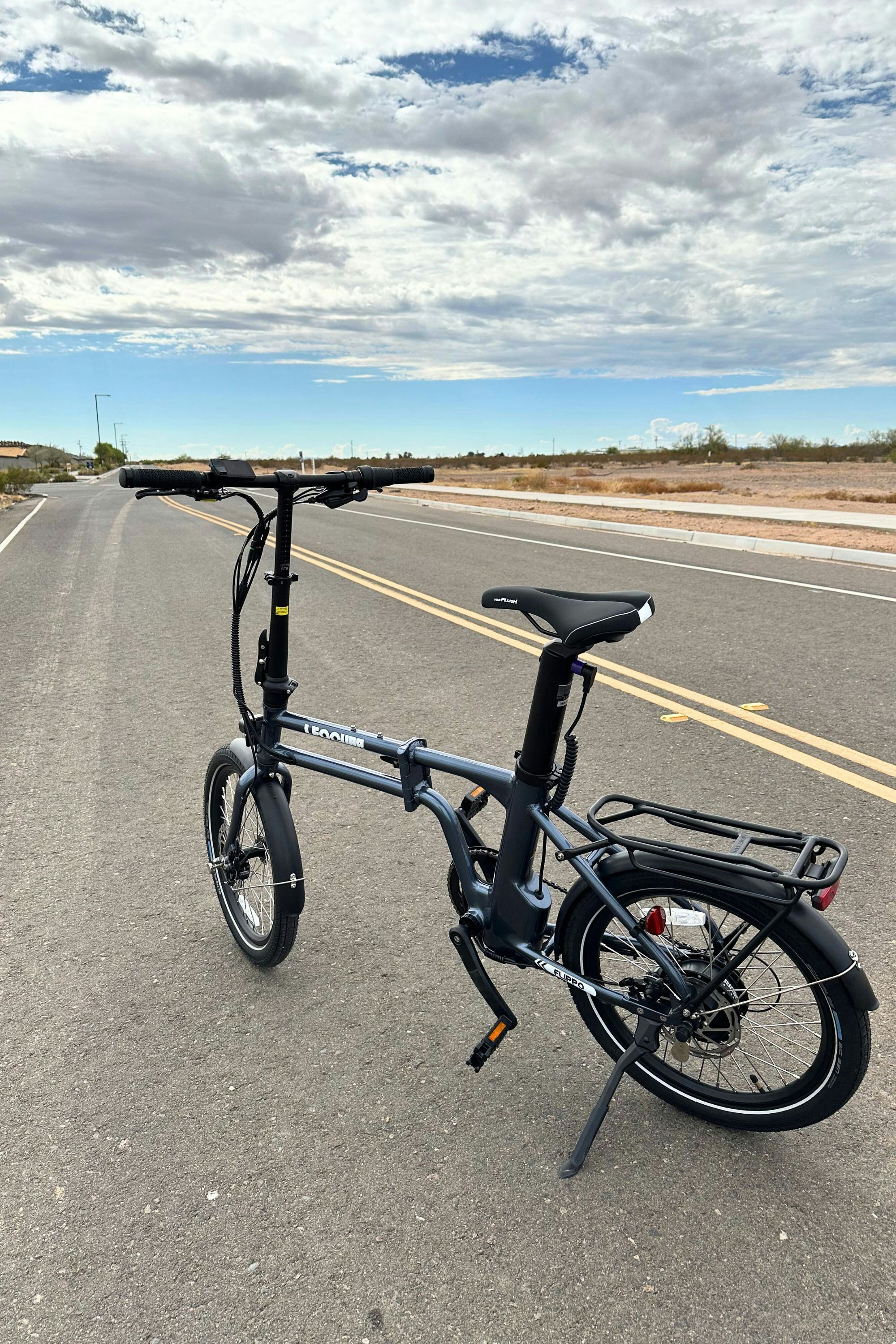 A bicycle parked on the side of the road