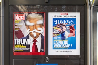 A newspaper dispenser on a city street
