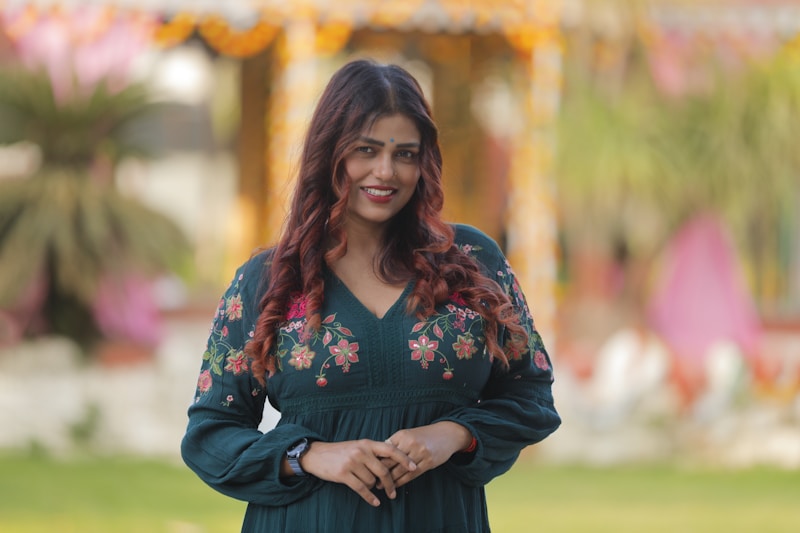 Elegant lady in green dress at the park