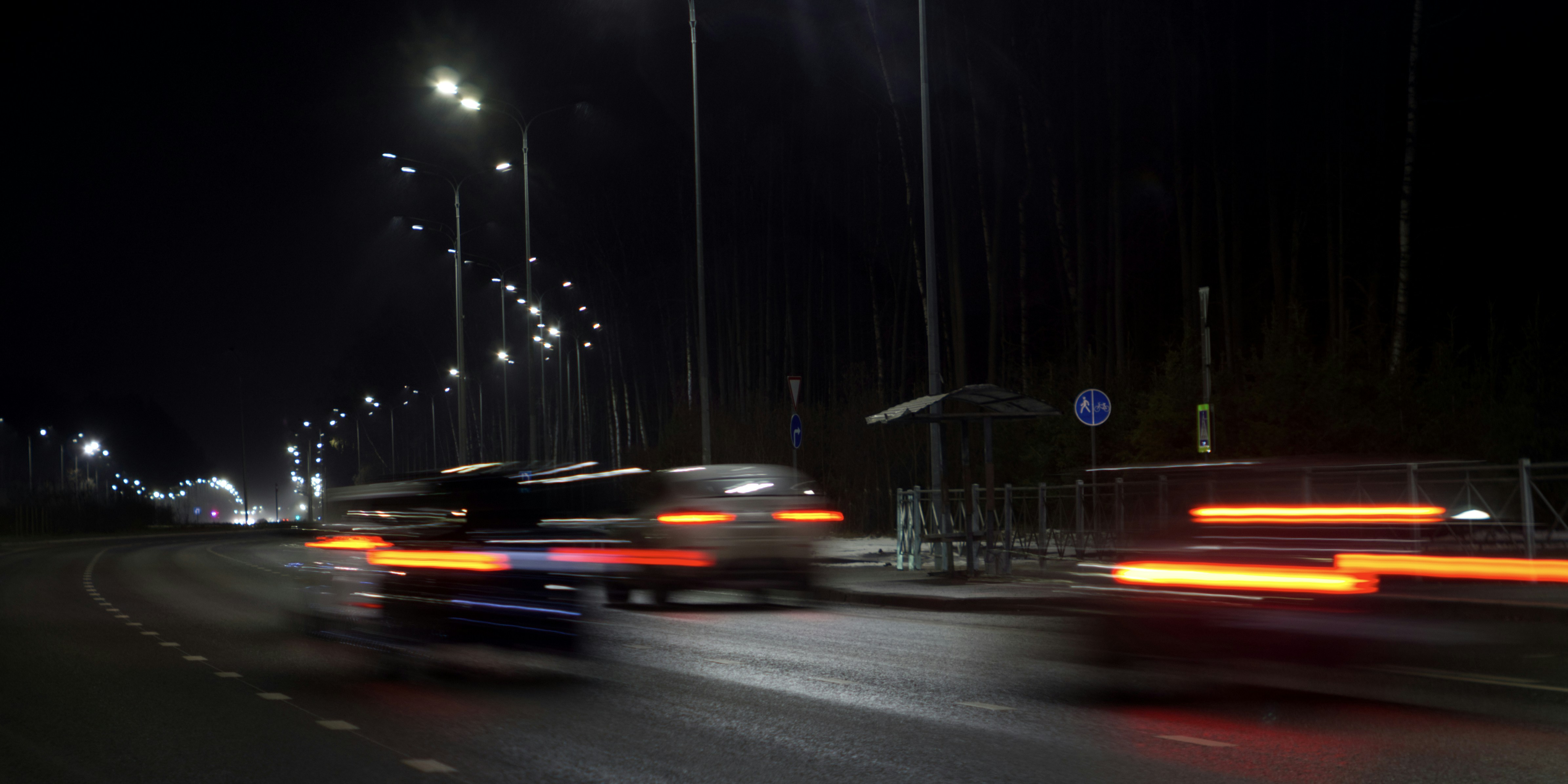 A blurry photo of a city street at night