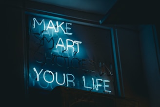 A neon sign that says make art your life