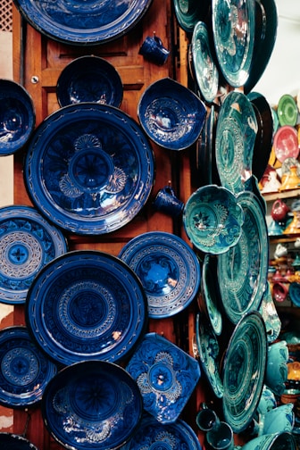 A bunch of blue plates stacked on top of each other