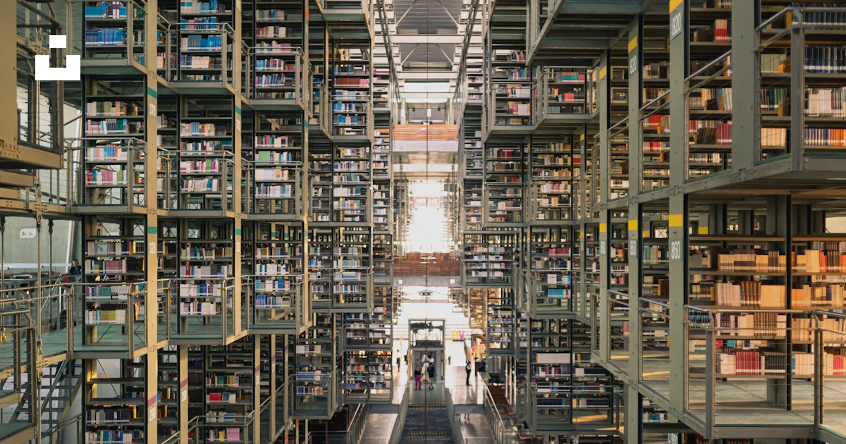 Full Length Library A large library filled with lots of books photo – Free Books Image on ...